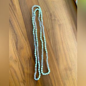 EUC 28” continuous strand faux pearls & clear crystals. Fun to wear as you like.